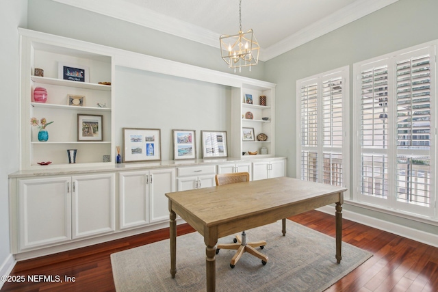 1867 Paradise Moorings Blvd, Middleburg, FL 32068 - home office featuring ornamental molding, a chandelier, dark wood-type flooring, and built in shelves