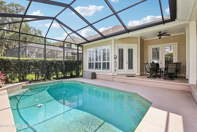 1867 Paradise Moorings Blvd, Middleburg, FL 32068 - outdoor pool featuring french doors, a patio area, a ceiling fan, and a lanai