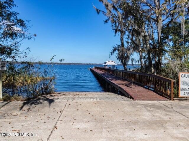 1867 Paradise Moorings Blvd, Middleburg, FL 32068 - dock featuring a water view and a boat ramp