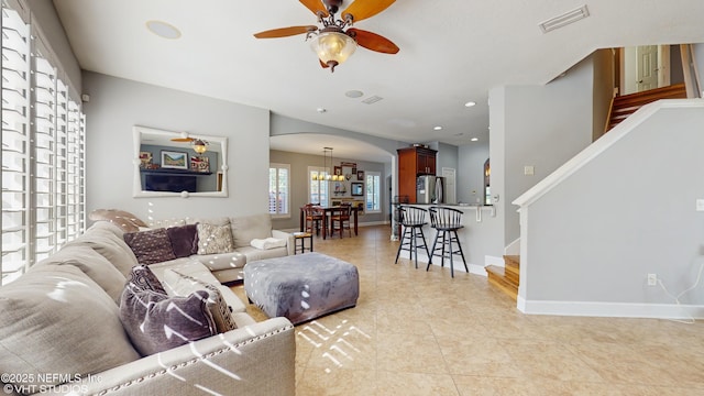 200 Huntston Way, Saint Johns, FL 32259 - living room with a ceiling fan, light tile patterned floors, arched walkways, stairs, and recessed lighting
