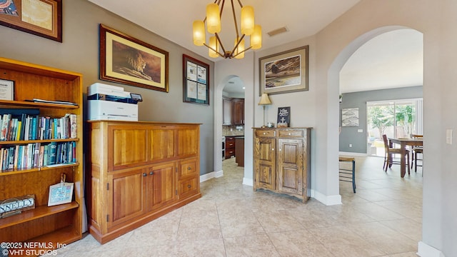 200 Huntston Way, Saint Johns, FL 32259 - hallway with arched walkways, a chandelier, and baseboards