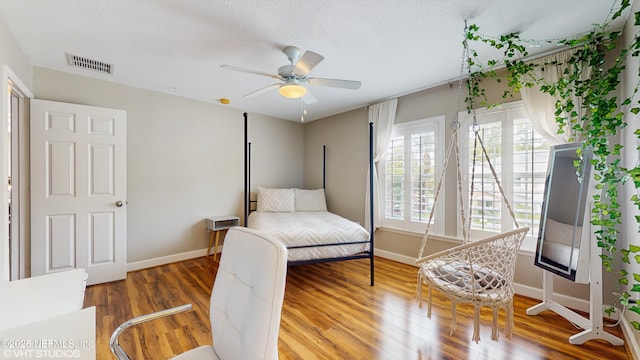 200 Huntston Way, Saint Johns, FL 32259 - bedroom with wood finished floors, baseboards, and ceiling fan