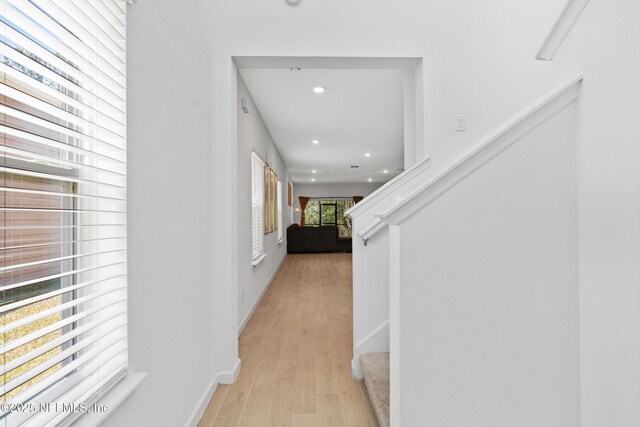 727 Lake Sinclair St, Saint Augustine, FL 32084 - hall featuring recessed lighting, light wood finished floors, stairway, and baseboards