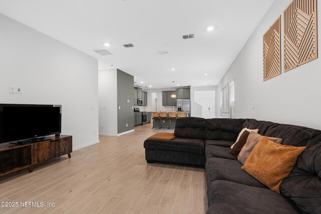 727 Lake Sinclair St, Saint Augustine, FL 32084 - living area featuring light wood-style flooring, baseboards, and recessed lighting