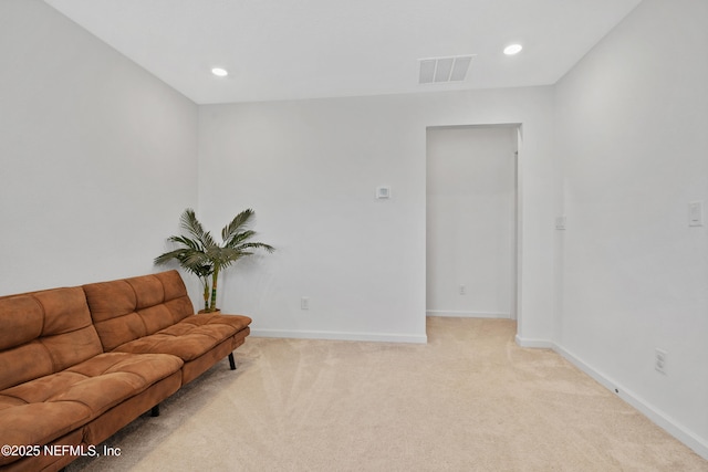 727 Lake Sinclair St, Saint Augustine, FL 32084 - sitting room with light colored carpet, baseboards, and recessed lighting
