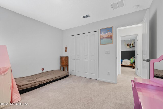 727 Lake Sinclair St, Saint Augustine, FL 32084 - carpeted bedroom with a closet and baseboards