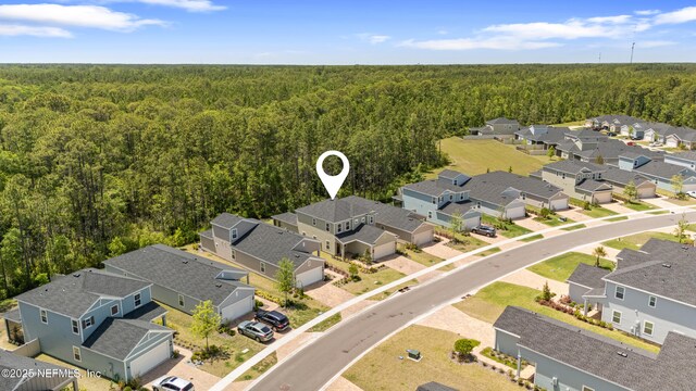 727 Lake Sinclair St, Saint Augustine, FL 32084 - aerial perspective of suburban area with a forest