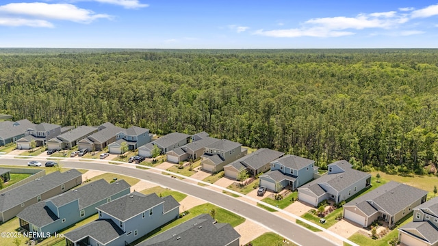 727 Lake Sinclair St, Saint Augustine, FL 32084 - aerial perspective of suburban area featuring a forest