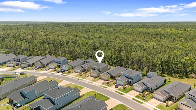 727 Lake Sinclair St, Saint Augustine, FL 32084 - aerial view of residential area featuring a forest