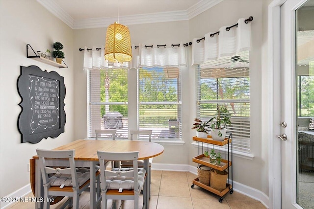 2005 Rivers Own Rd, Saint Augustine, FL 32092 - dining room featuring baseboards, light tile patterned floors, crown molding, and healthy amount of natural light