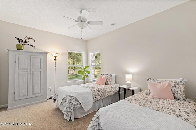 2005 Rivers Own Rd, Saint Augustine, FL 32092 - bedroom featuring light carpet, baseboards, and a ceiling fan