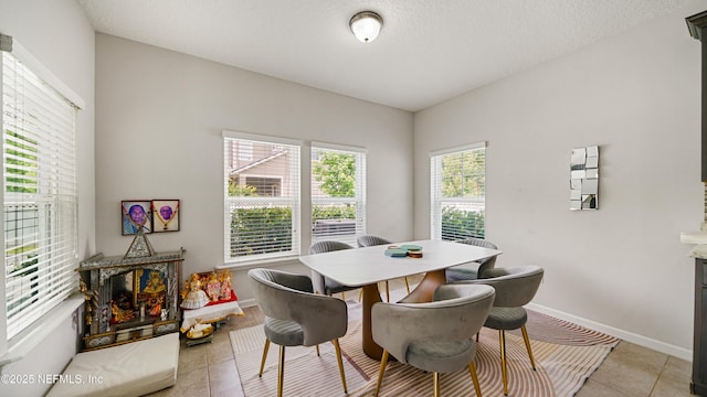 514 Heron Landing Rd, Saint Johns, FL 32259 - dining room featuring baseboards and light tile patterned flooring