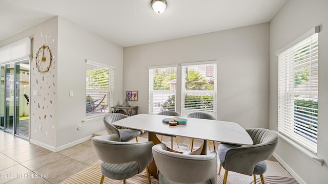 514 Heron Landing Rd, Saint Johns, FL 32259 - dining area featuring light tile patterned floors and baseboards