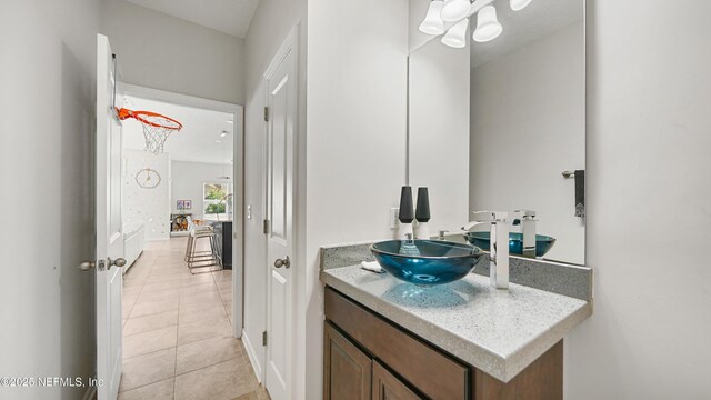 514 Heron Landing Rd, Saint Johns, FL 32259 - bathroom with tile patterned floors, vanity, and baseboards