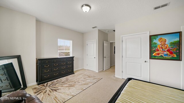 514 Heron Landing Rd, Saint Johns, FL 32259 - bedroom featuring light carpet, baseboards, and a textured ceiling