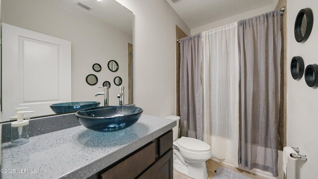 514 Heron Landing Rd, Saint Johns, FL 32259 - bathroom featuring vanity, toilet, and shower / bathtub combination with curtain