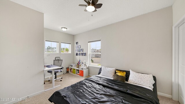 514 Heron Landing Rd, Saint Johns, FL 32259 - carpeted bedroom with baseboards and ceiling fan