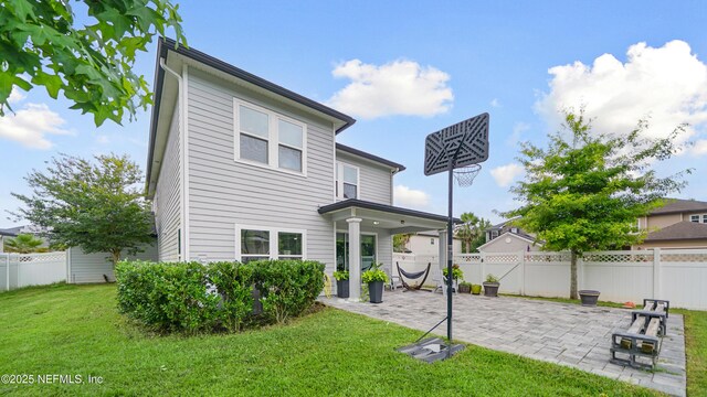 514 Heron Landing Rd, Saint Johns, FL 32259 - back of property featuring a patio area