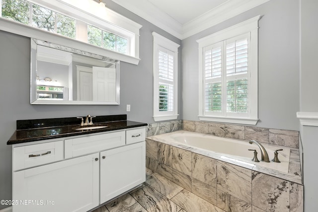 318 Sophia Ter, Saint Augustine, FL 32095 - full bath featuring marble finish floors, a garden tub, vanity, and crown molding