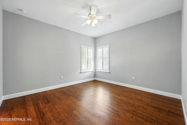 318 Sophia Ter, Saint Augustine, FL 32095 - spare room featuring ceiling fan, baseboards, dark wood-style flooring, and a smoke detector