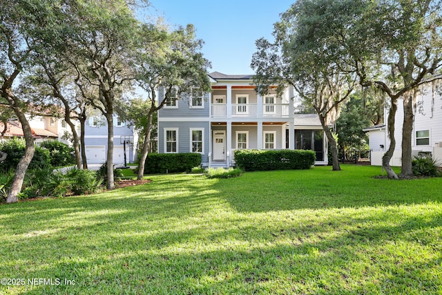 318 Sophia Ter, Saint Augustine, FL 32095 - greek revival inspired property with a balcony and a front lawn