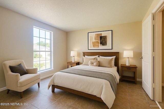 10244 Pine Breeze Rd W, Jacksonville, FL 32257 - tiled bedroom featuring baseboards