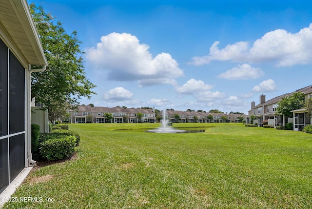 11000 Castlemain Cir E, Jacksonville, FL 32256 - view of green lawn with a residential view and a water view