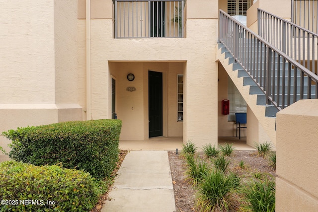 204 Augusta Cir, Saint Augustine, FL 32086 - entrance to property with stucco siding