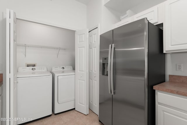 204 Augusta Cir, Saint Augustine, FL 32086 - washroom featuring washing machine and dryer and light tile patterned floors