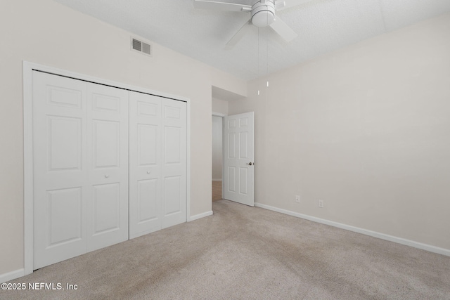 204 Augusta Cir, Saint Augustine, FL 32086 - unfurnished bedroom with carpet, a closet, baseboards, and ceiling fan