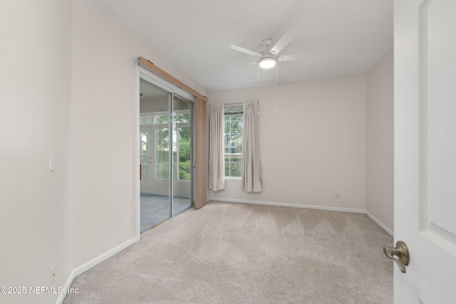 204 Augusta Cir, Saint Augustine, FL 32086 - empty room with carpet, ceiling fan, and baseboards