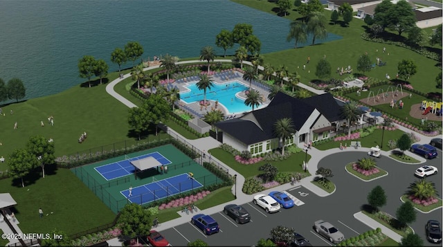 bird's eye view of a pool and a nearby body of water