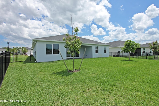 back of property with stucco siding