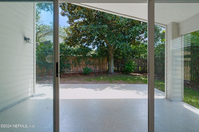view of patio / terrace featuring fence