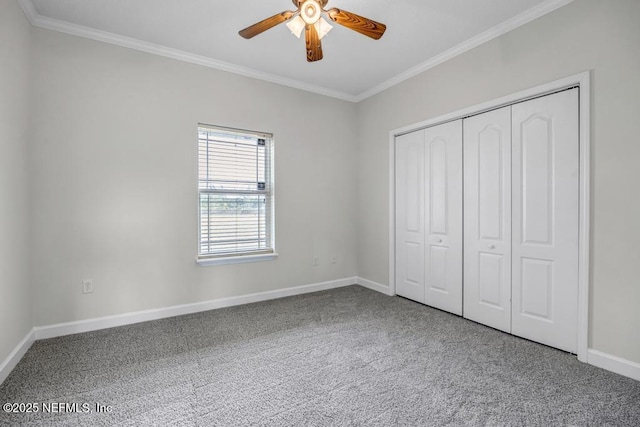 27359 Geiger Rd, Hilliard, FL 32046 - unfurnished bedroom featuring ornamental molding, carpet flooring, baseboards, a closet, and a ceiling fan