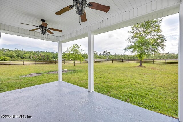 27359 Geiger Rd, Hilliard, FL 32046 - view of patio with a ceiling fan and a view of countryside