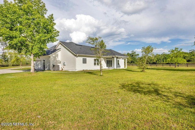 27359 Geiger Rd, Hilliard, FL 32046 - back of property with concrete driveway and an attached garage