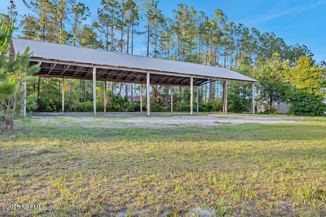 27359 Geiger Rd, Hilliard, FL 32046 - view of grassy yard with a detached carport