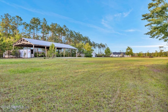27359 Geiger Rd, Hilliard, FL 32046 - view of grassy yard with a detached carport