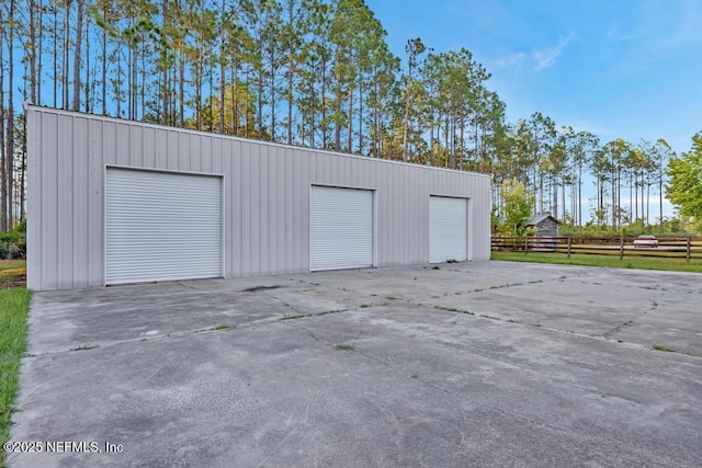 27359 Geiger Rd, Hilliard, FL 32046 - detached garage with fence