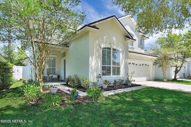 767 Mosswood Chase St, Orange Park, FL 32065 - view of front of house with concrete driveway and stucco siding