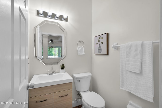 767 Mosswood Chase St, Orange Park, FL 32065 - bathroom featuring toilet, vanity, and ceiling fan