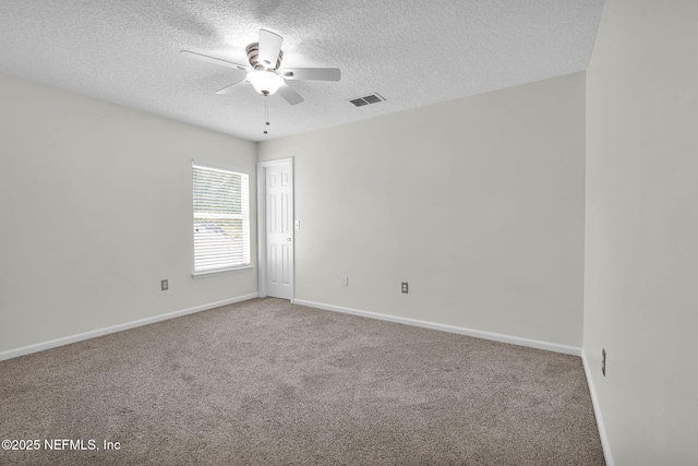 767 Mosswood Chase St, Orange Park, FL 32065 - carpeted spare room featuring a textured ceiling, a ceiling fan, and baseboards