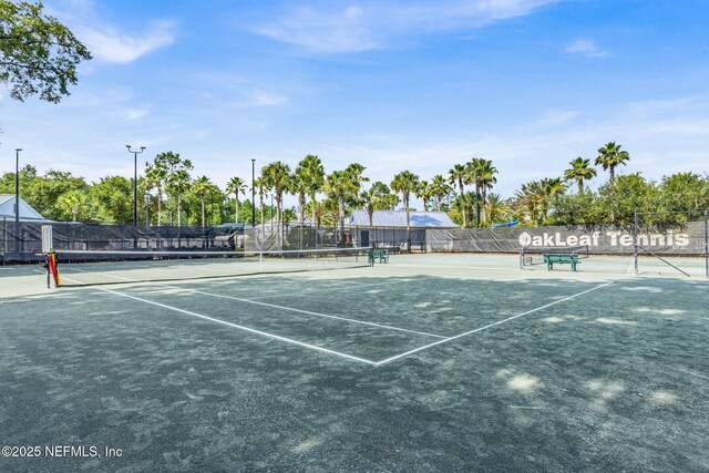767 Mosswood Chase St, Orange Park, FL 32065 - view of tennis court featuring fence