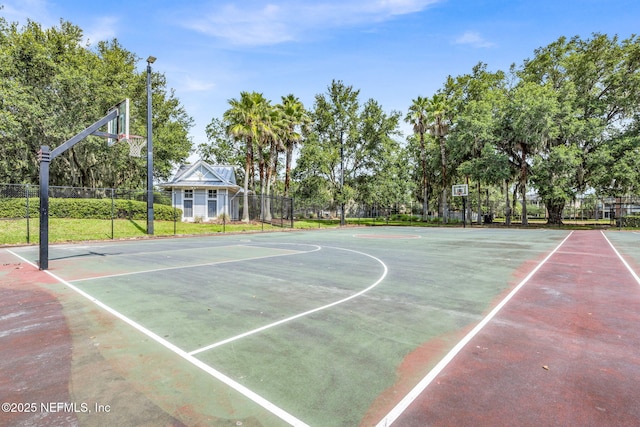 767 Mosswood Chase St, Orange Park, FL 32065 - view of basketball court featuring community basketball court, fence, and view of scattered trees