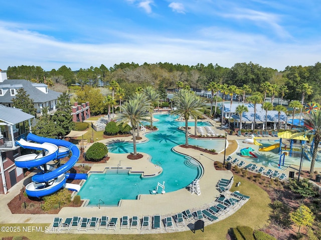 767 Mosswood Chase St, Orange Park, FL 32065 - view of swimming pool featuring view of wooded area