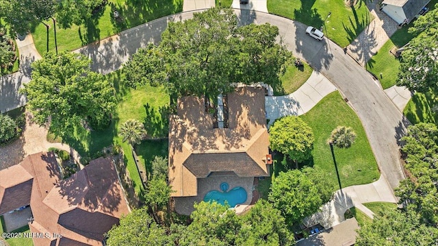 view of property location with a pool area