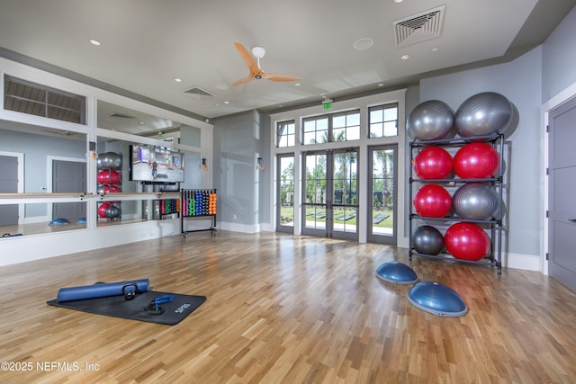 exercise room featuring a ceiling fan, wood finished floors, baseboards, and recessed lighting