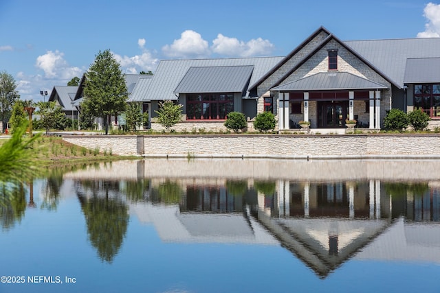 view of building exterior with a water view