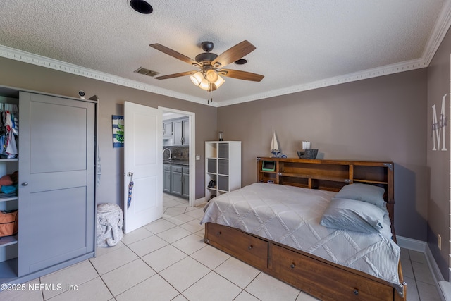 806 Falkirk Ct, Orange Park, FL 32073 - bedroom featuring light tile patterned floors, a closet, a sink, ornamental molding, and a textured ceiling
